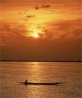 Man and Pirogue, Sunset, Niger River, Mali, West Africa